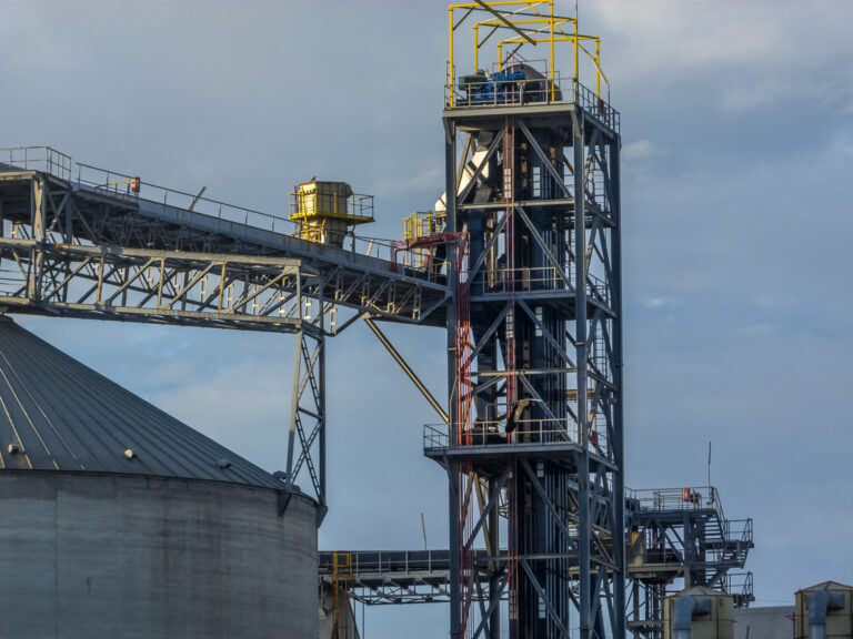 Silos and pier in golden hour